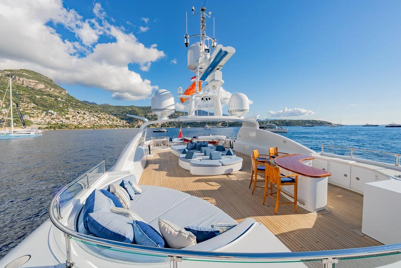 The sundeck offers luxurious lounging areas with stunning views of the surrounding waters. aboard LATITUDE Yacht for Sale