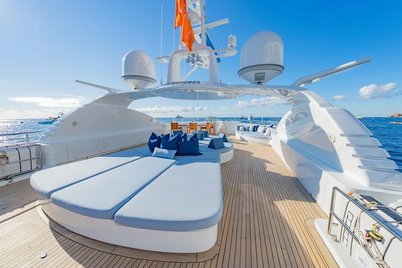 The sundeck offers luxurious lounging with plush sunbeds and stunning ocean views. aboard LATITUDE Yacht for Sale