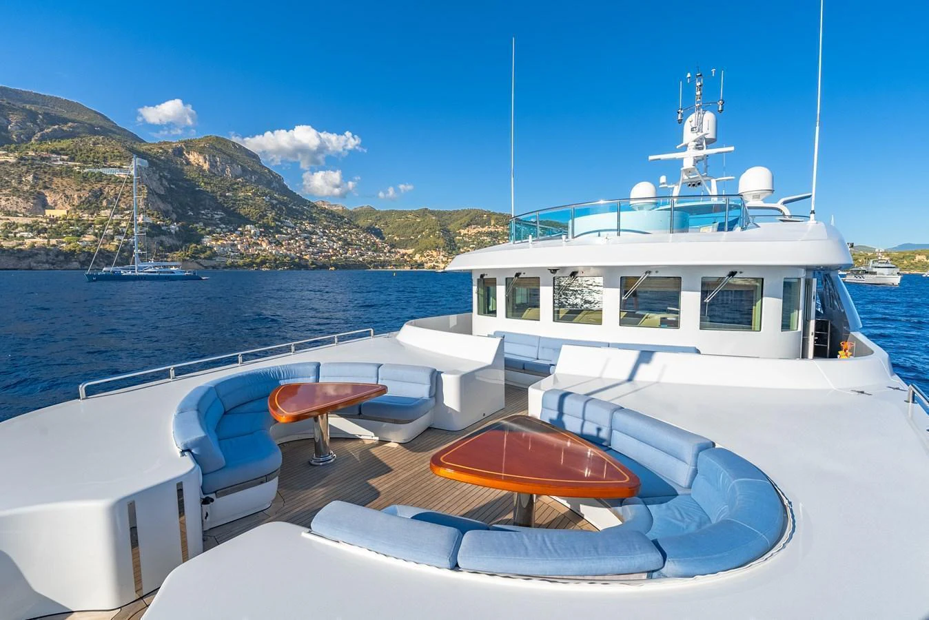 The sundeck offers luxurious seating with stunning views of the surrounding waters and coastline. aboard LATITUDE Yacht for Sale