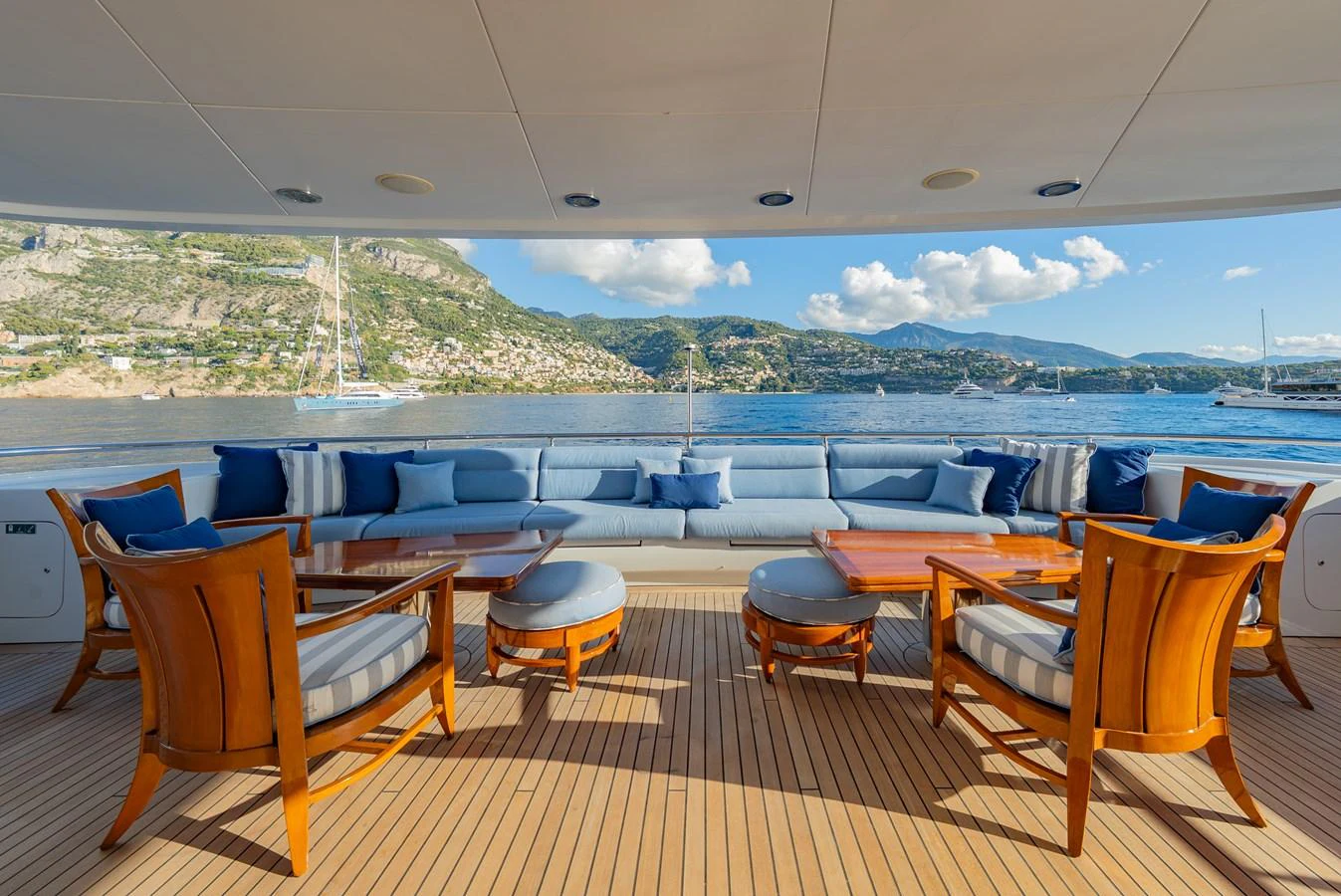 The aft deck offers a spacious and inviting seating area with stunning views of the surrounding waters. aboard LATITUDE Yacht for Sale