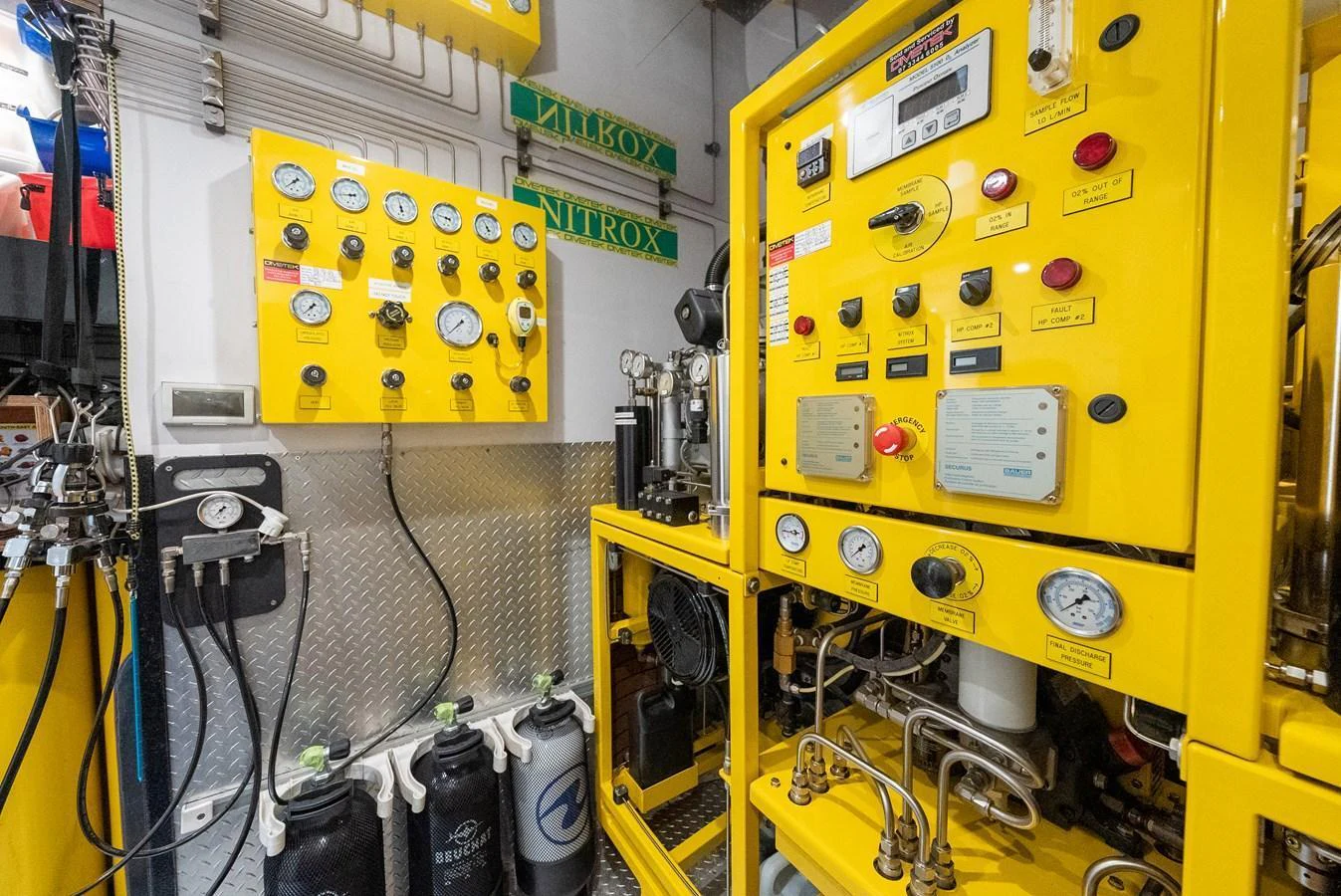 The image showcases the intricate and well-maintained equipment in the yacht's engine room. aboard LATITUDE Yacht for Sale