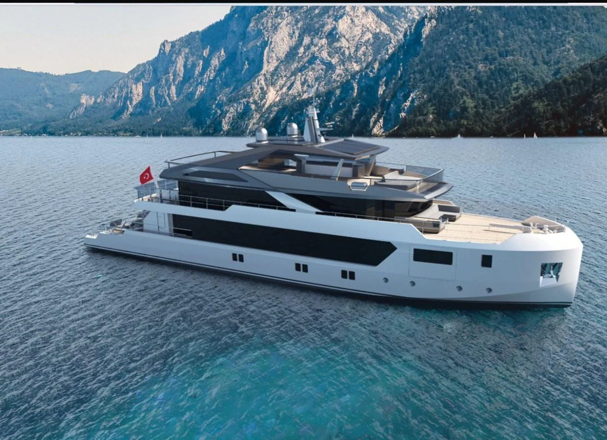A sleek and modern yacht cruising in a serene mountainous backdrop. aboard SOYASLAN CUSTOM Yacht for Sale