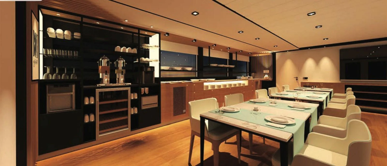 The yacht's dining area features a modern design with elegant table settings and ambient lighting. aboard SOYASLAN CUSTOM Yacht for Sale