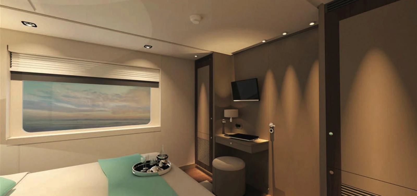 A cozy stateroom with a large window offering a serene ocean view and modern amenities. aboard SOYASLAN CUSTOM Yacht for Sale