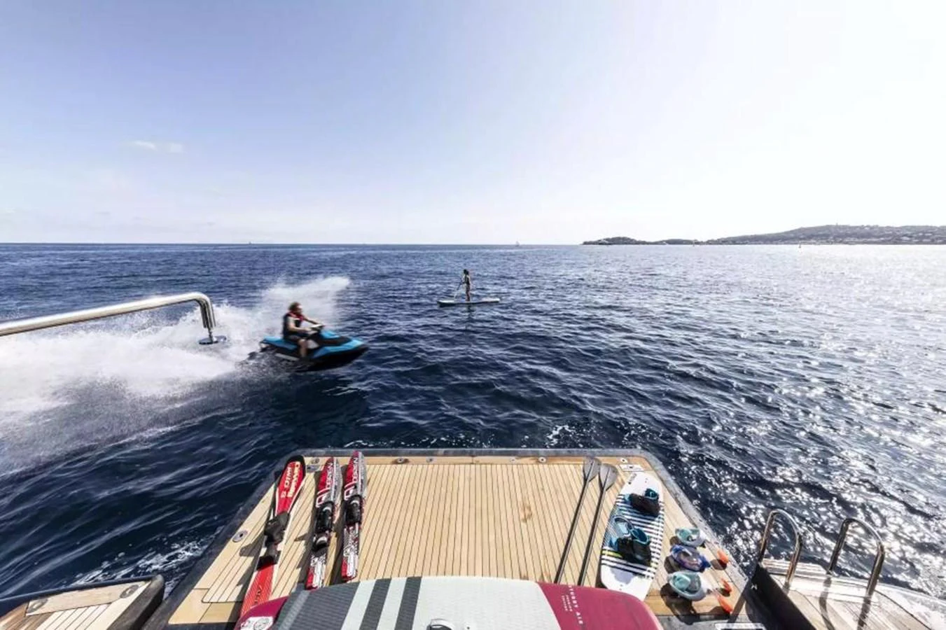 The yacht's swim platform is equipped with water sports gear, offering thrilling activities on the open sea. aboard SOHO Yacht for Sale