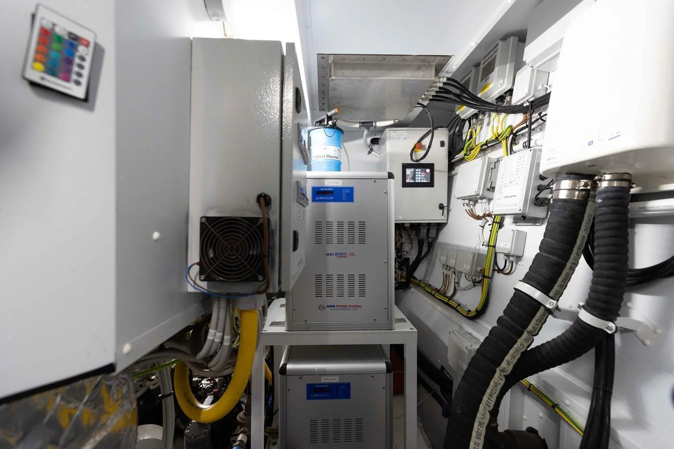 The image showcases the yacht's engine room with various technical equipment and machinery. aboard CHAMELEON Yacht for Sale