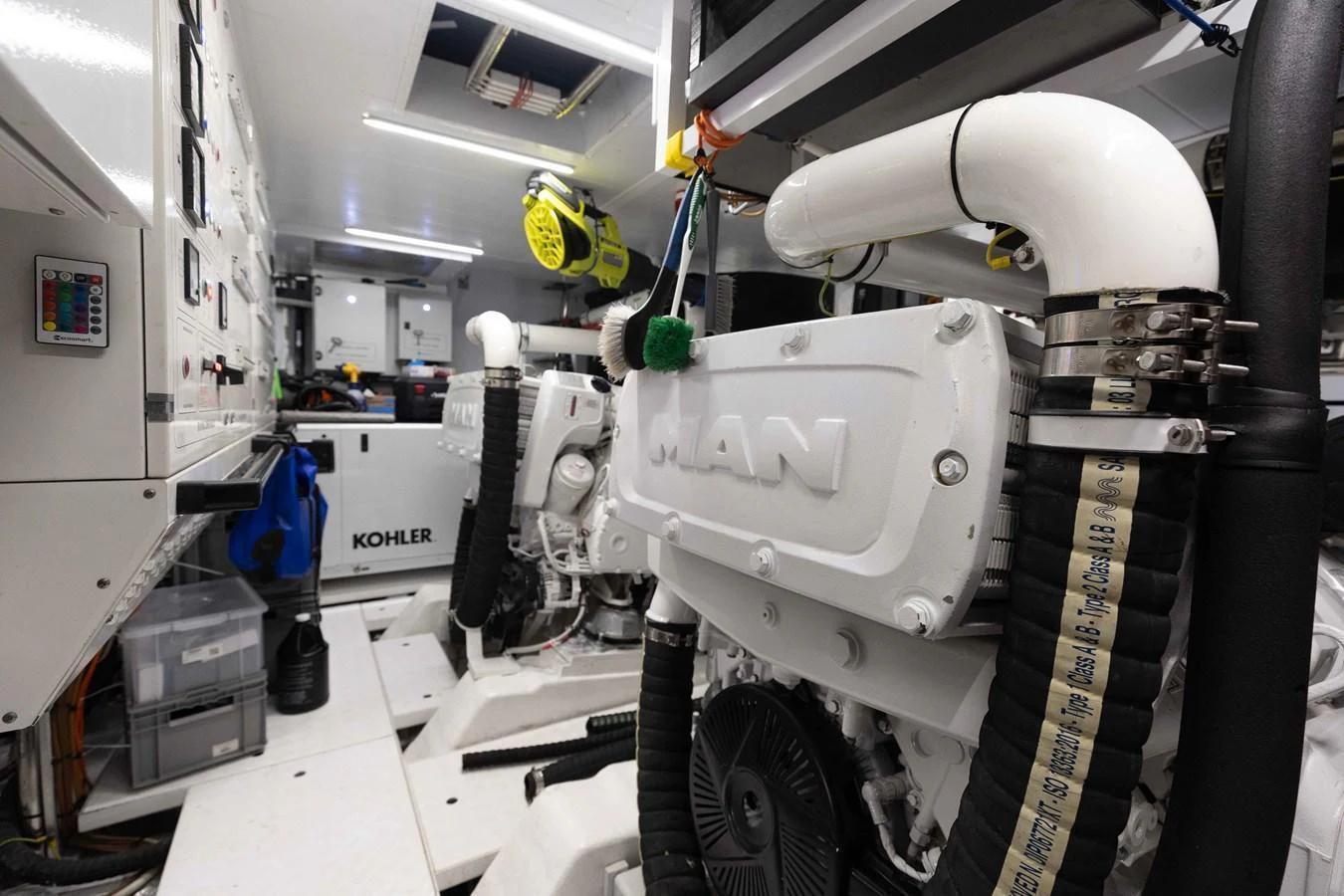 The image showcases the yacht's well-maintained engine room with powerful machinery. aboard CHAMELEON Yacht for Sale