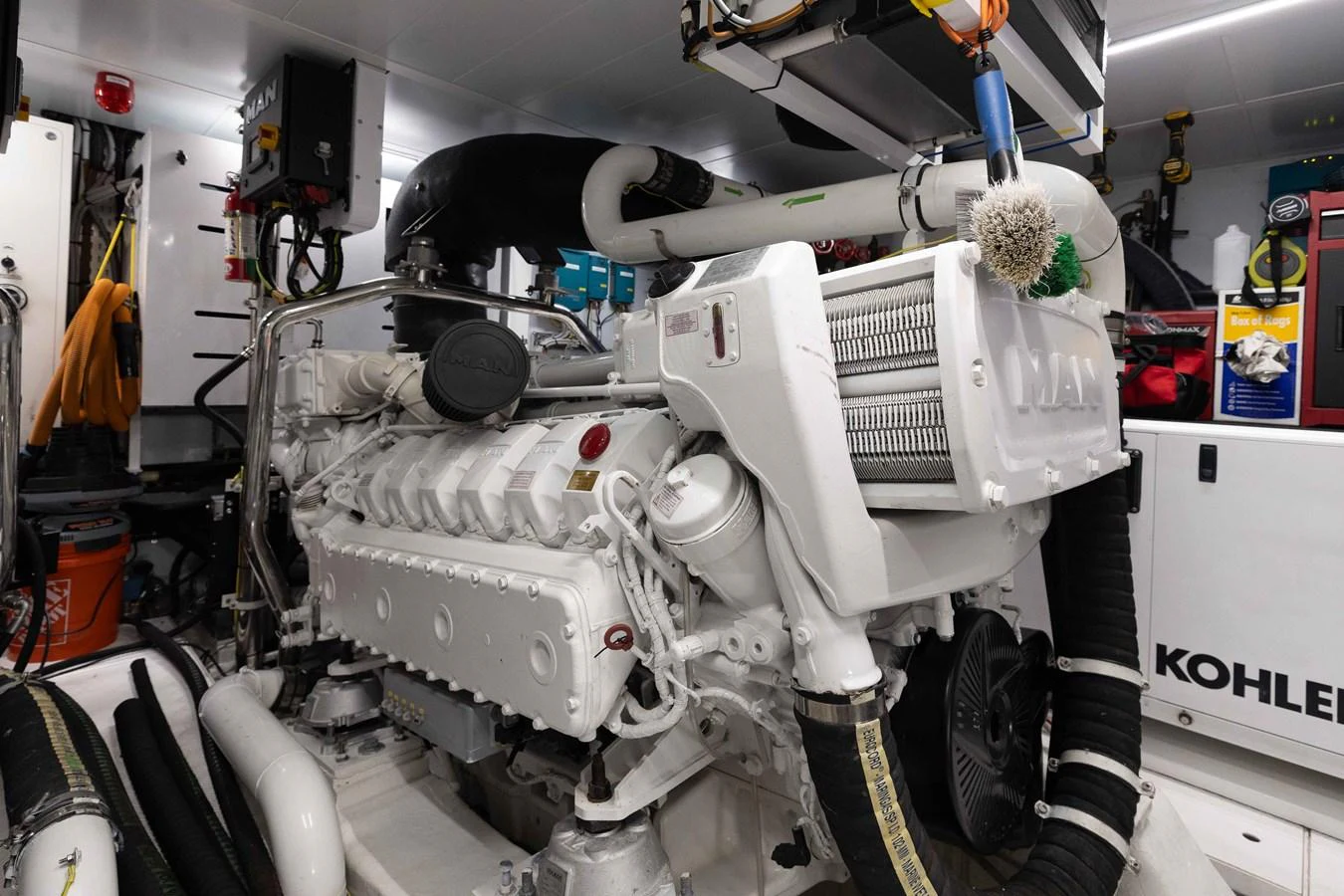 The image showcases the pristine and well-maintained engine room of the yacht, highlighting its powerful machinery. aboard CHAMELEON Yacht for Sale