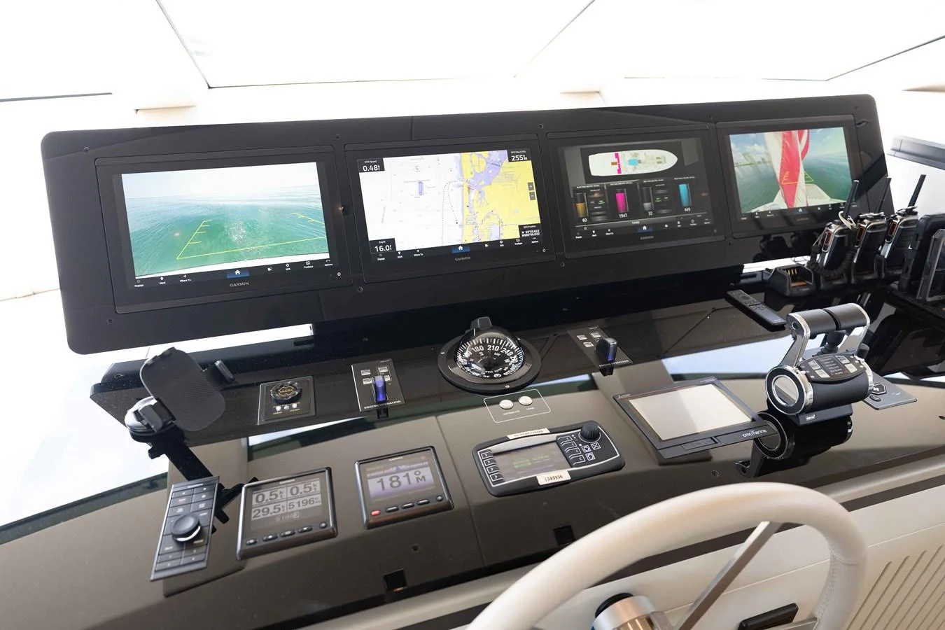 The helm station is equipped with advanced navigation and control systems for a seamless sailing experience. aboard CHAMELEON Yacht for Sale