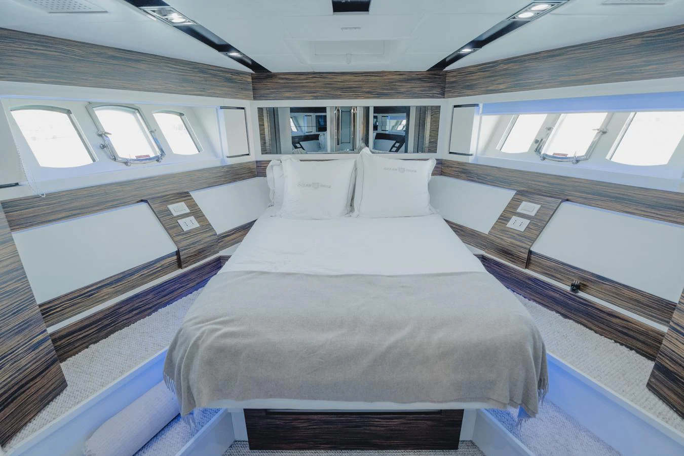 a room with a bed and a window aboard SCUDERIA Yacht for Sale