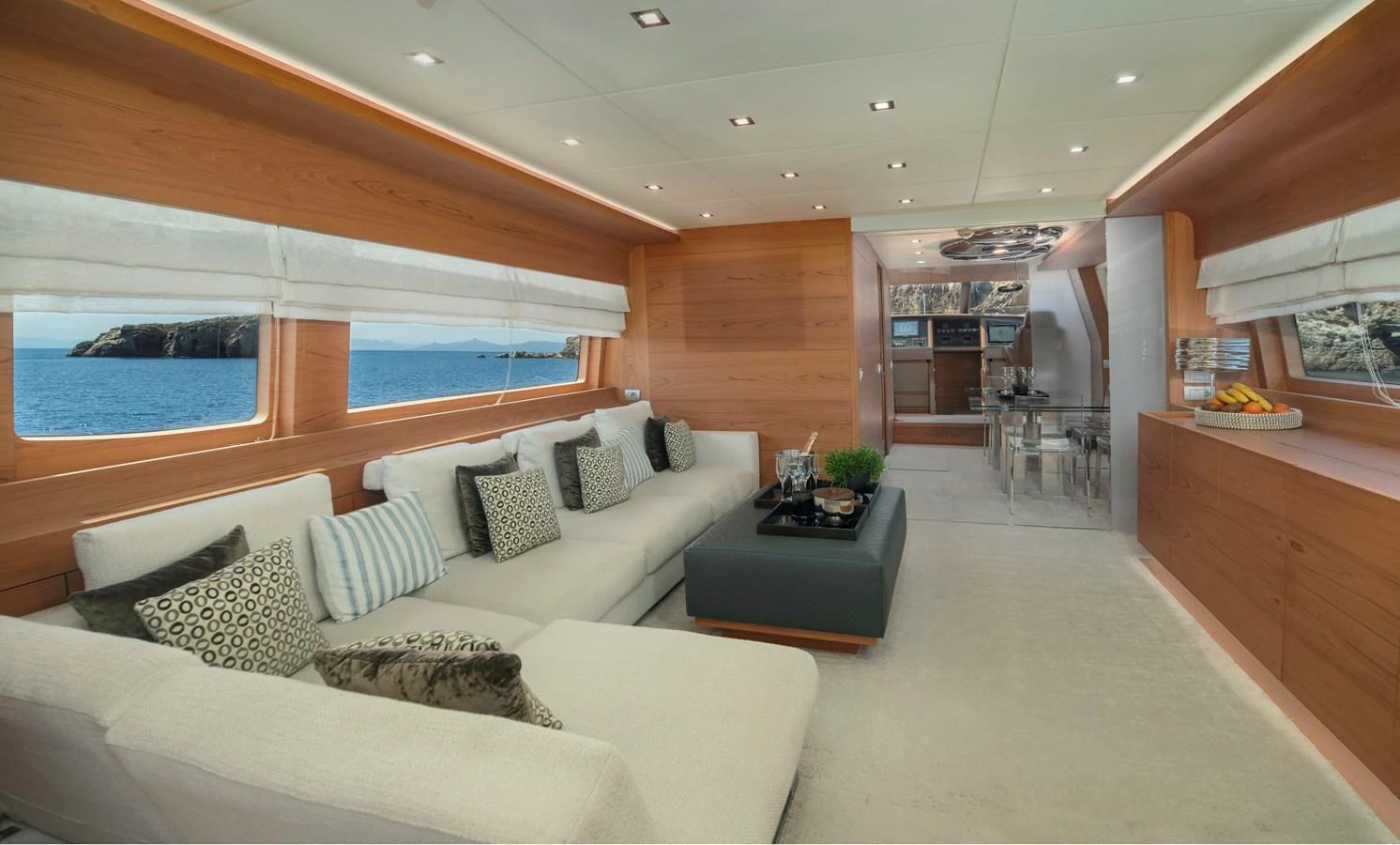 a room with a bed and a table aboard EL PECADO Yacht for Sale
