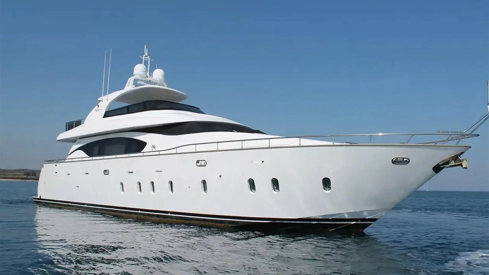 a white yacht on the water aboard EL PECADO Yacht for Sale
