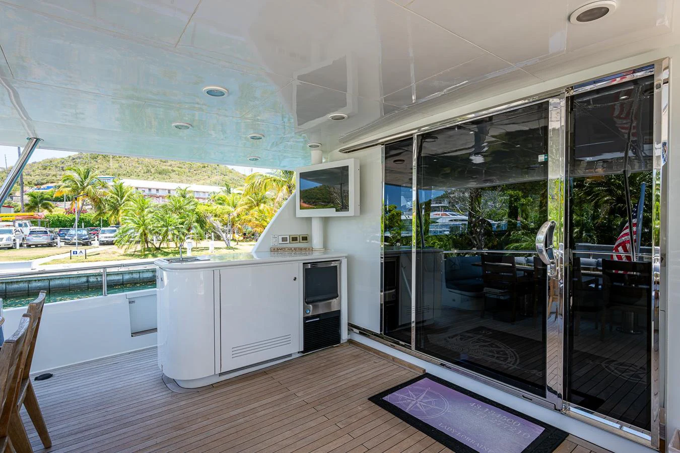 The aft deck offers a comfortable and stylish outdoor space with modern amenities and a view of the surroundings. aboard TEST NAME Yacht for Sale