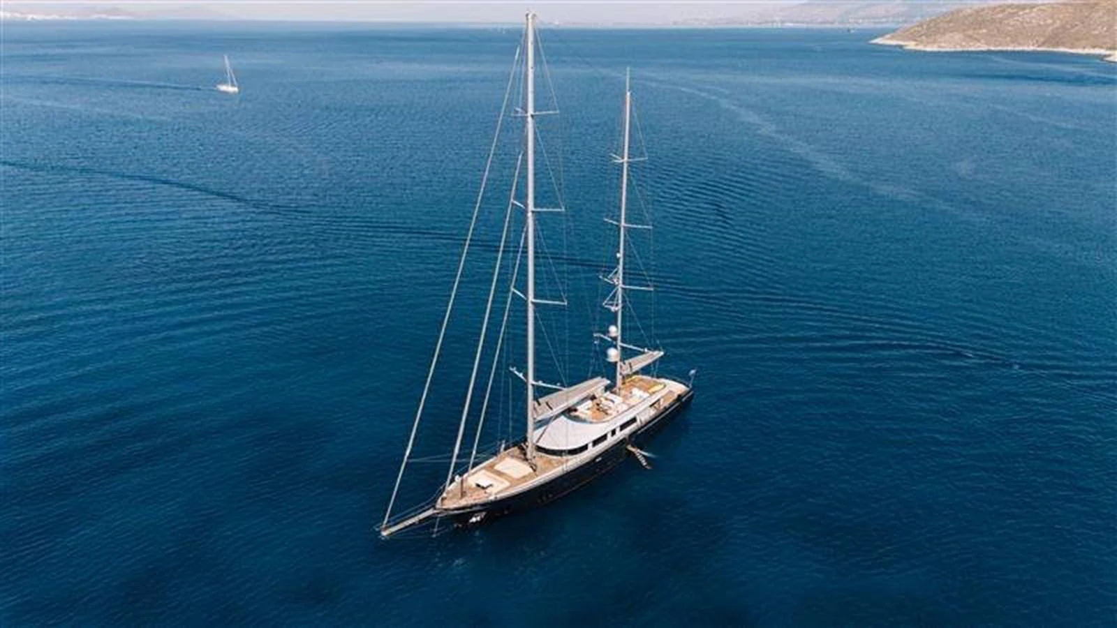 a boat on the water aboard ATLANTIS PEARL Yacht for Sale