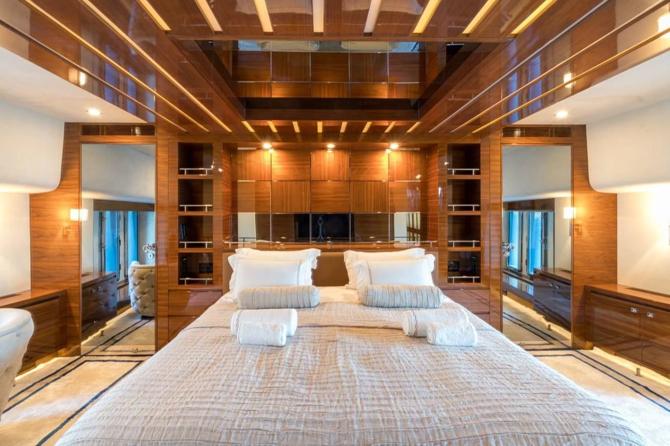 a large bed in a room aboard ATLANTIS PEARL Yacht for Sale