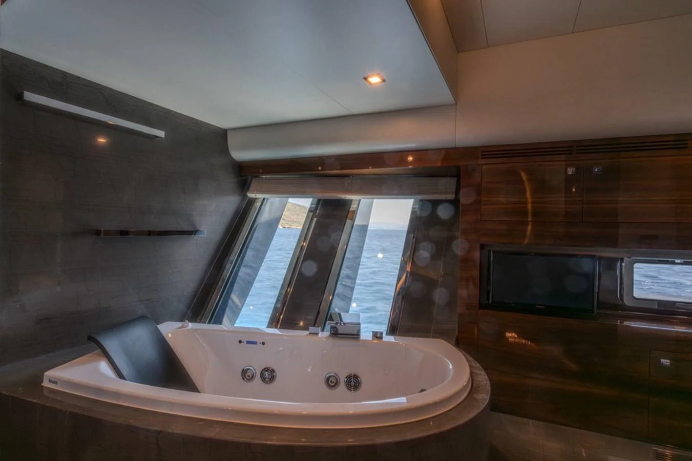 a kitchen with a large glass window aboard ATLANTIS PEARL Yacht for Sale