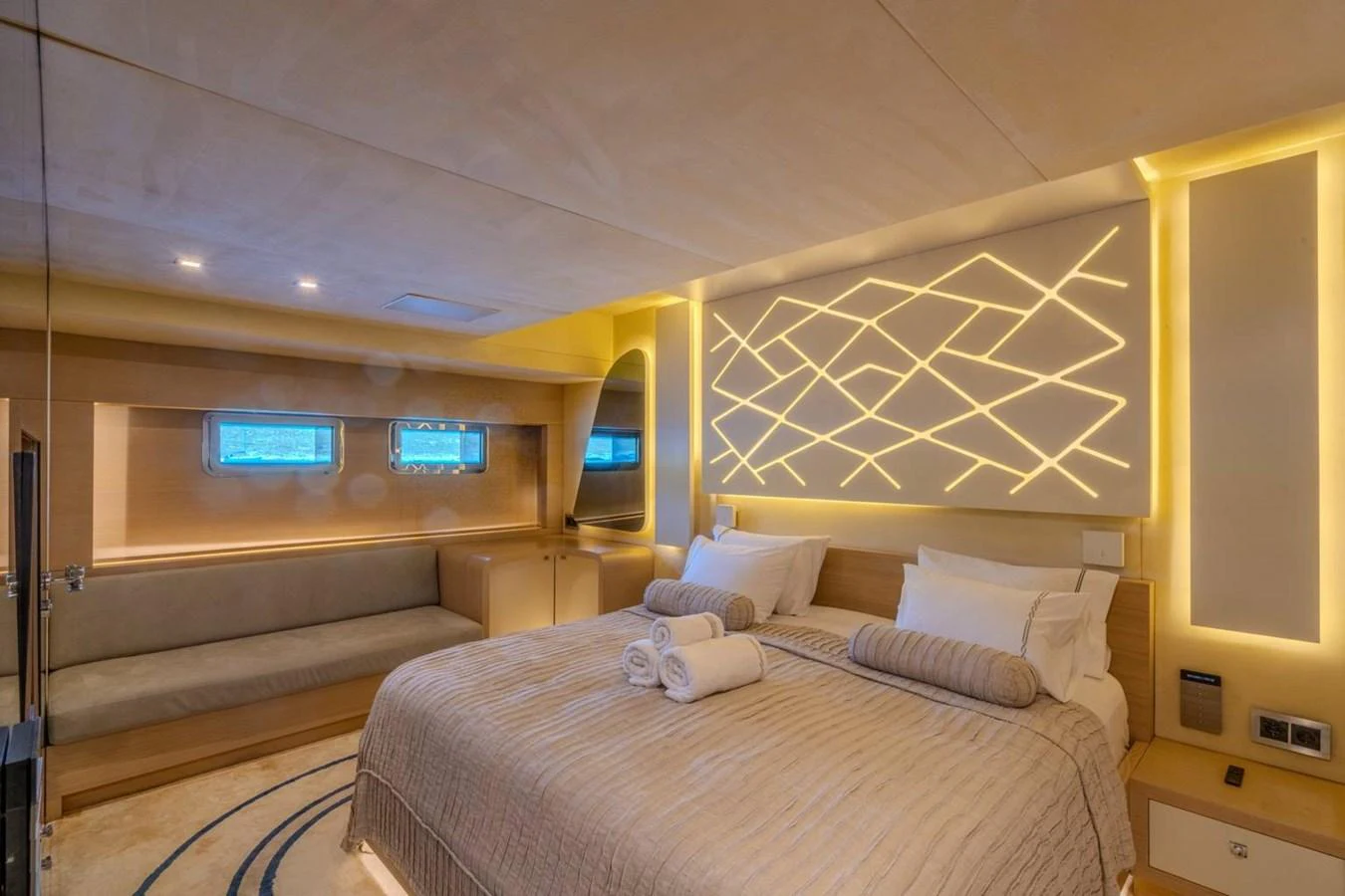 a bed in a room aboard ATLANTIS PEARL Yacht for Sale