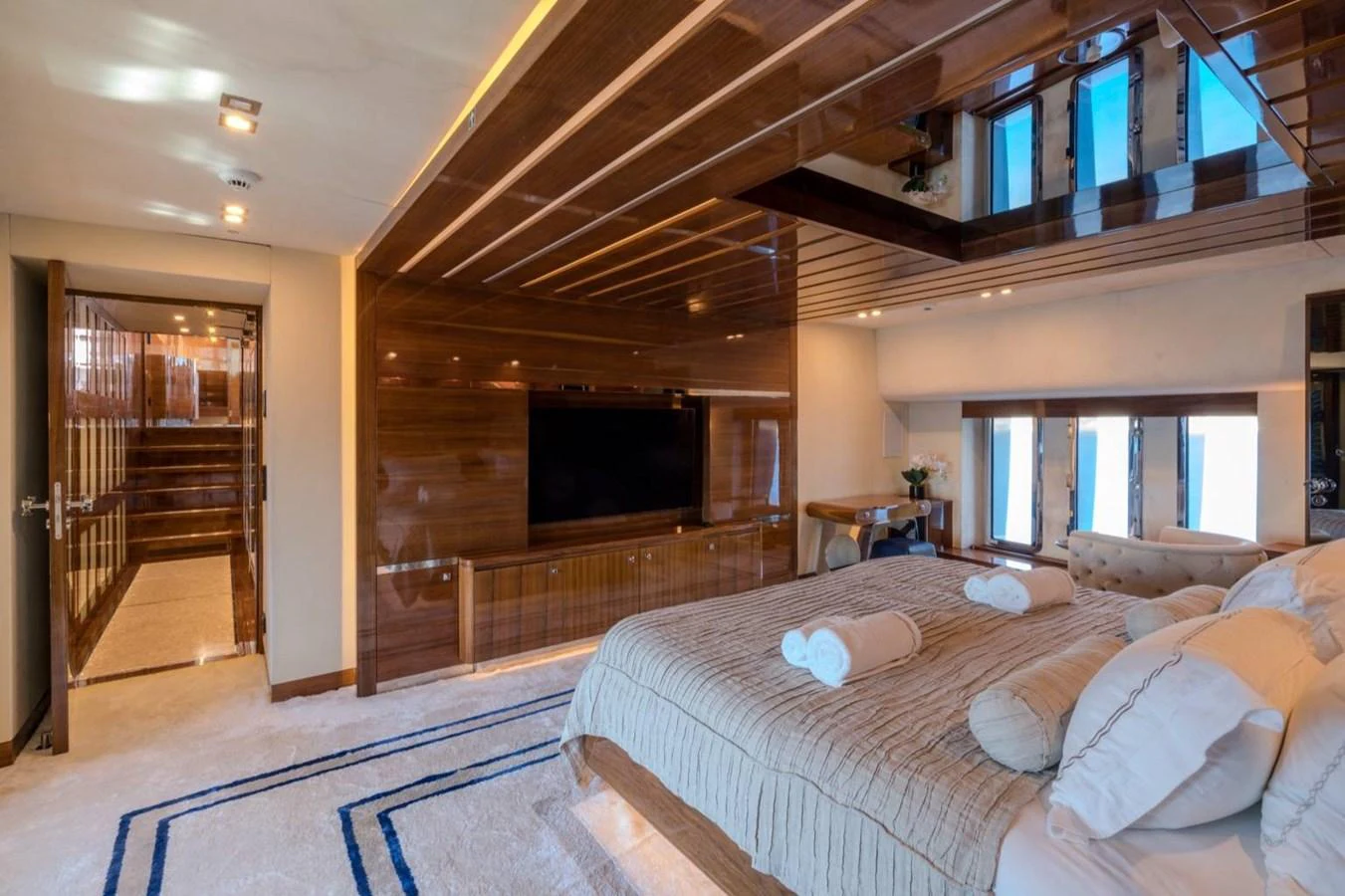 a large bedroom with a large bed aboard ATLANTIS PEARL Yacht for Sale