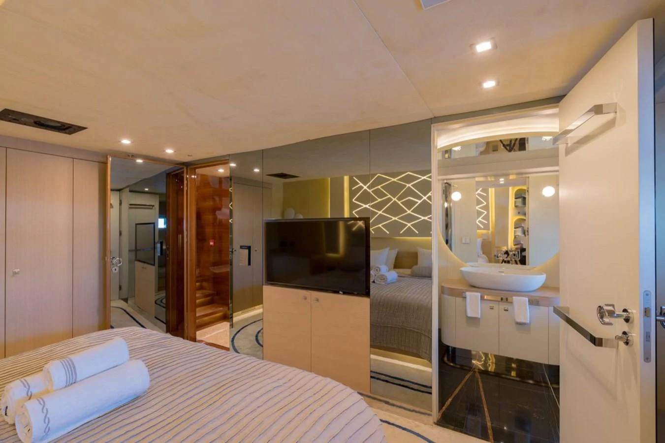 a bathroom with a large mirror aboard ATLANTIS PEARL Yacht for Sale