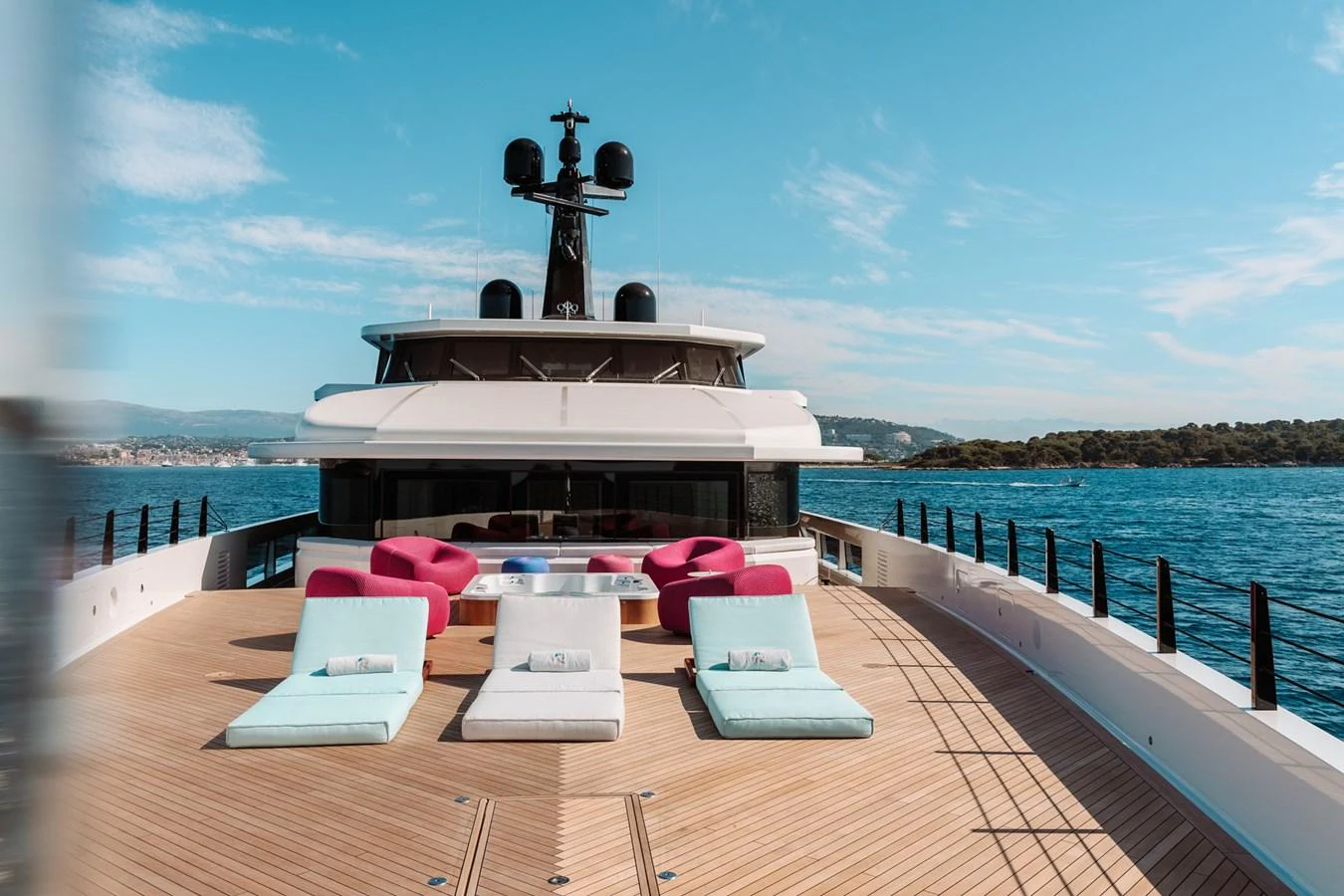 The sundeck features luxurious sun loungers and a jacuzzi, offering a perfect spot for relaxation with stunning ocean views. aboard RIO Yacht for Sale