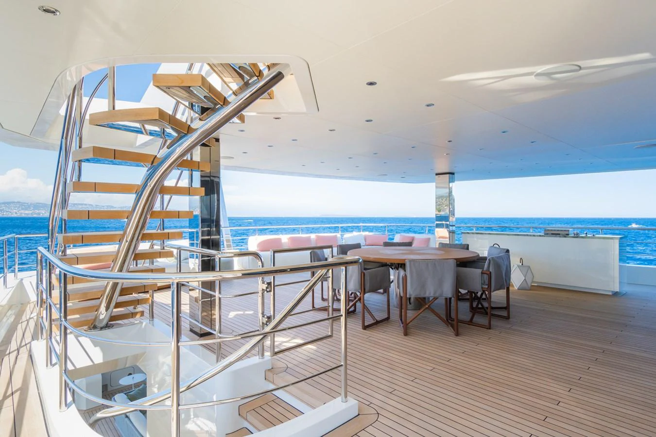 The aft deck offers a spacious and elegant area for dining and relaxation with stunning ocean views. aboard RIO Yacht for Sale