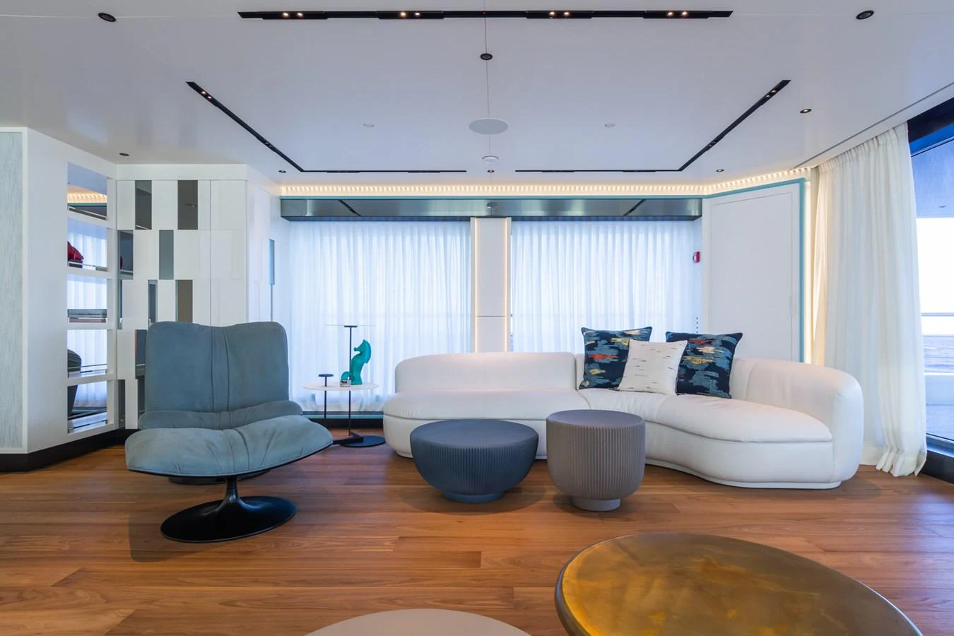 The salon features modern furnishings with a comfortable seating area and stylish decor. aboard RIO Yacht for Sale