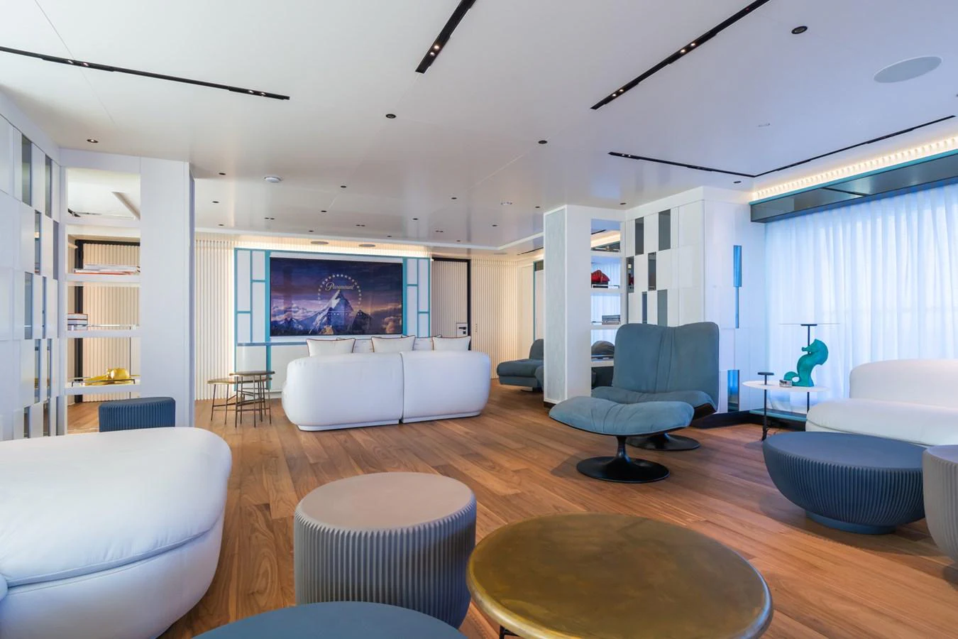 The salon features modern furnishings and a spacious layout with ample natural light. aboard RIO Yacht for Sale