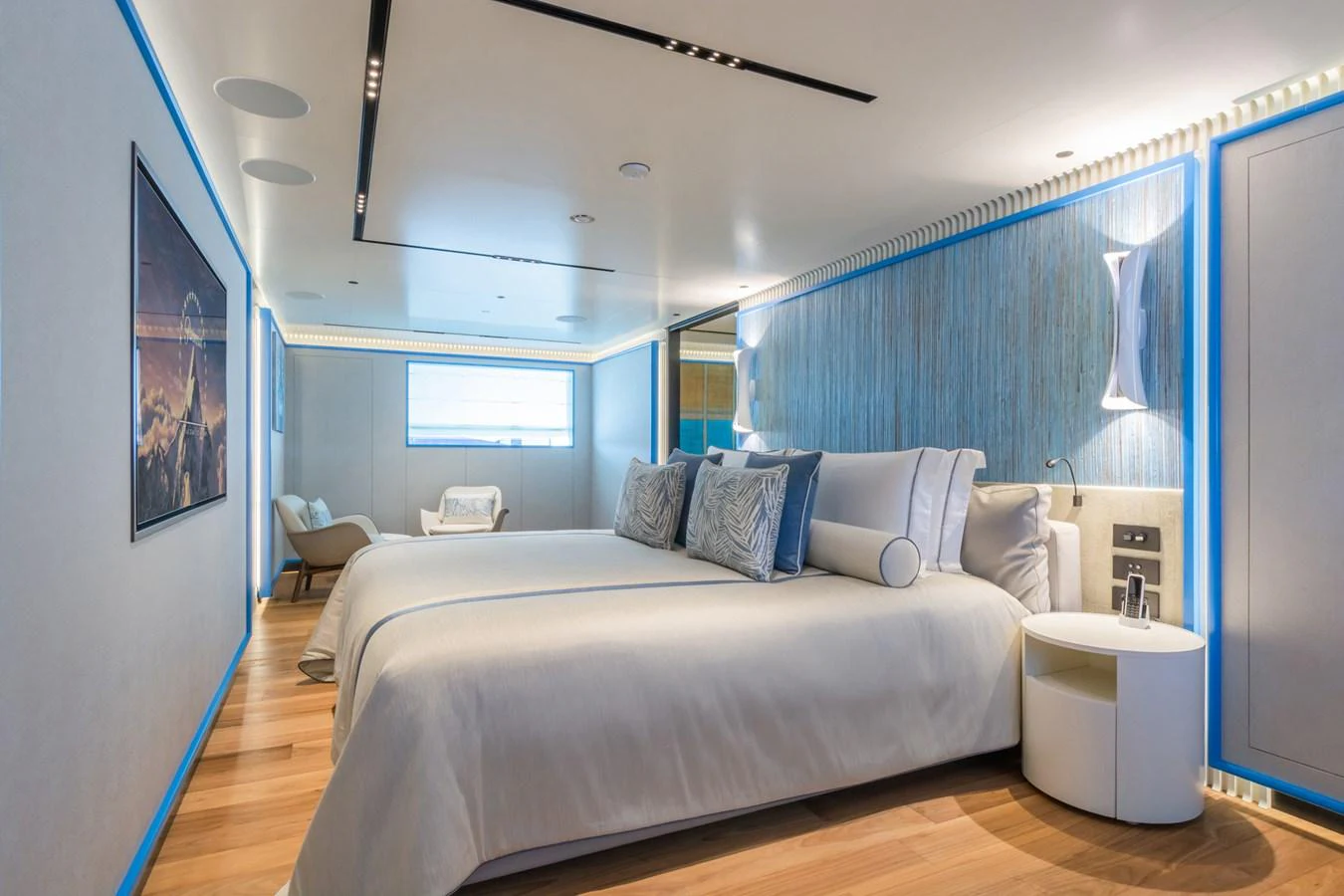 A beautifully appointed guest stateroom featuring twin beds and modern decor. aboard RIO Yacht for Sale