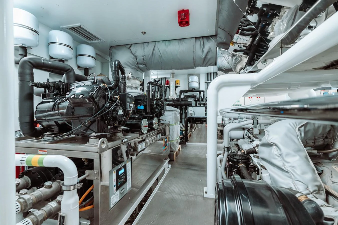 The engine room showcases the yacht's advanced mechanical systems and meticulous engineering. aboard RIO Yacht for Sale