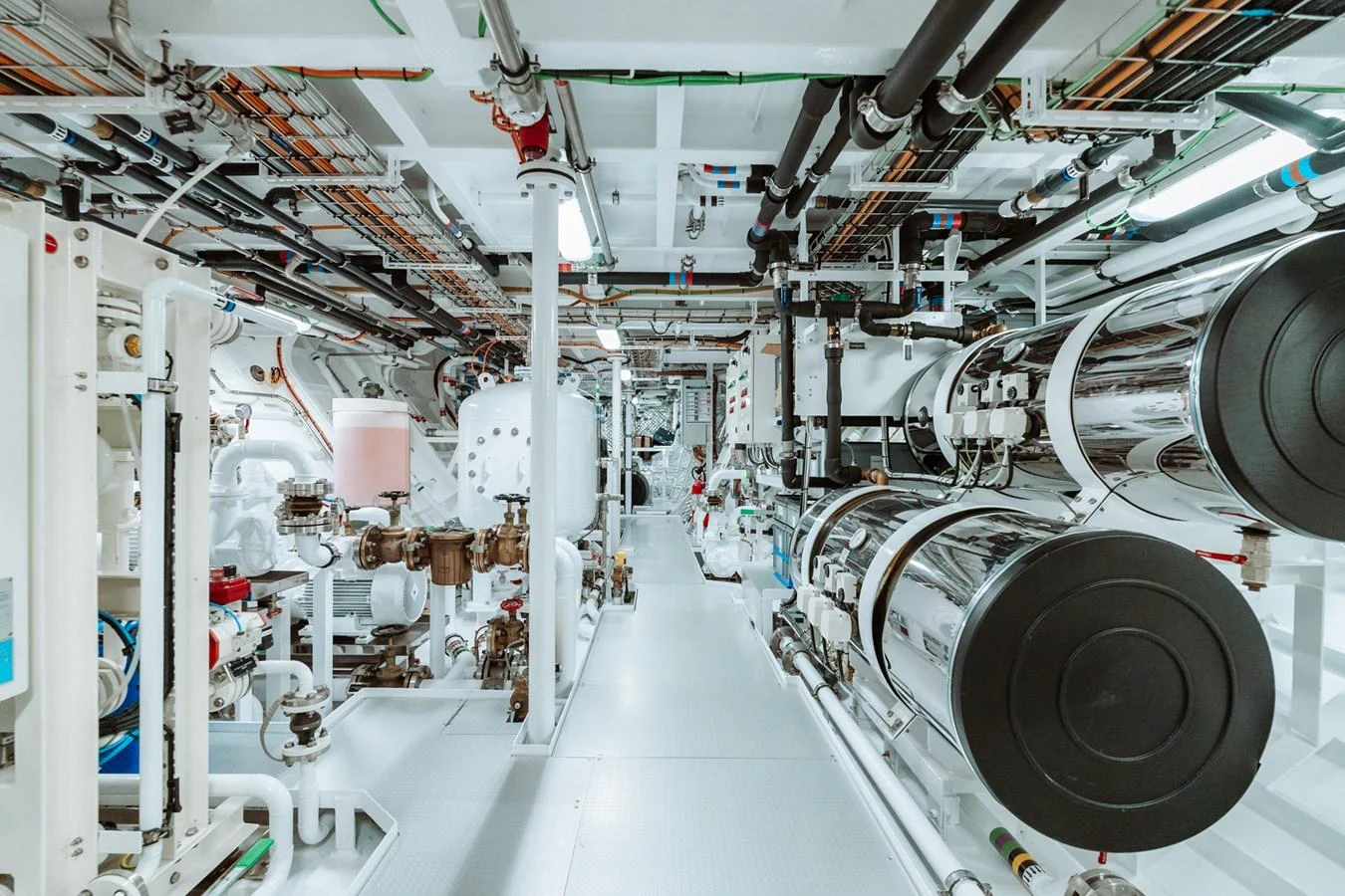 The engine room showcases a meticulously organized and high-tech mechanical space. aboard RIO Yacht for Sale