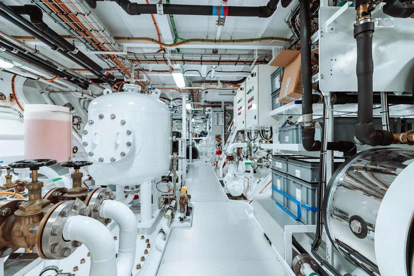 The engine room showcases a well-organized and meticulously maintained space with advanced machinery and equipment. aboard RIO Yacht for Sale