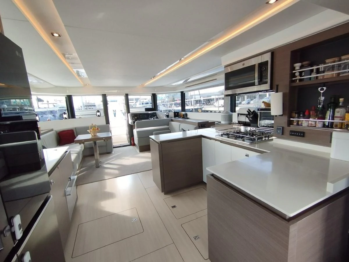 The yacht's galley is spacious and modern, featuring sleek countertops and ample natural light. aboard LEOPARD 28M Yacht for Sale