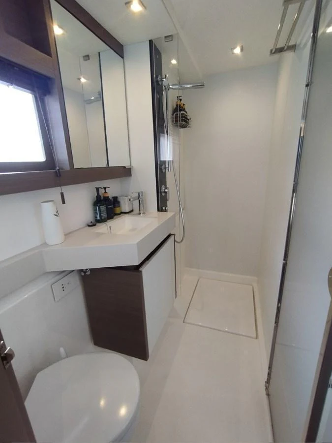 The yacht's bathroom features modern fixtures and a sleek design. aboard LEOPARD 28M Yacht for Sale