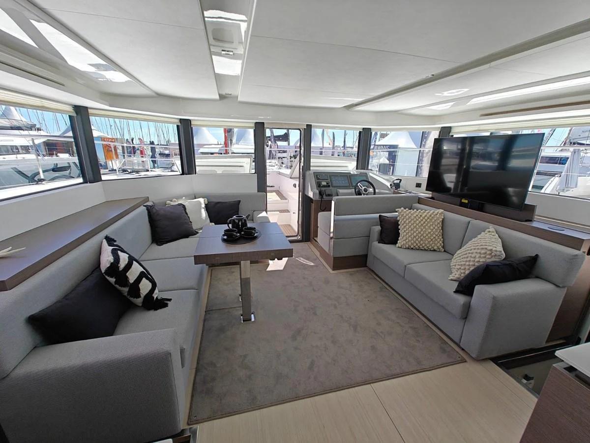 The salon features modern furnishings with ample seating and a large flat-screen TV. aboard LEOPARD 28M Yacht for Sale