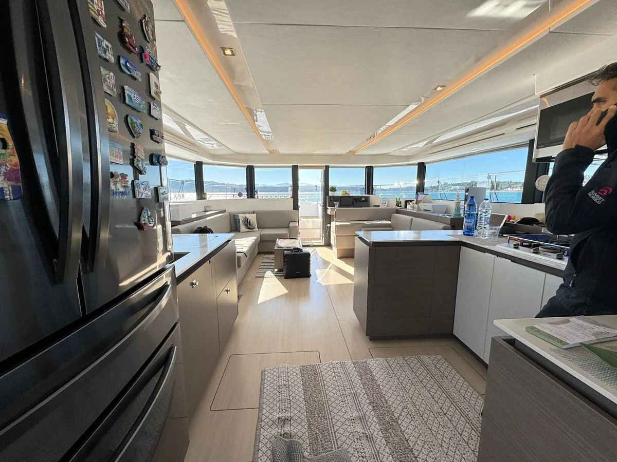The modern galley area features sleek appliances and ample natural light. aboard LEOPARD 28M Yacht for Sale