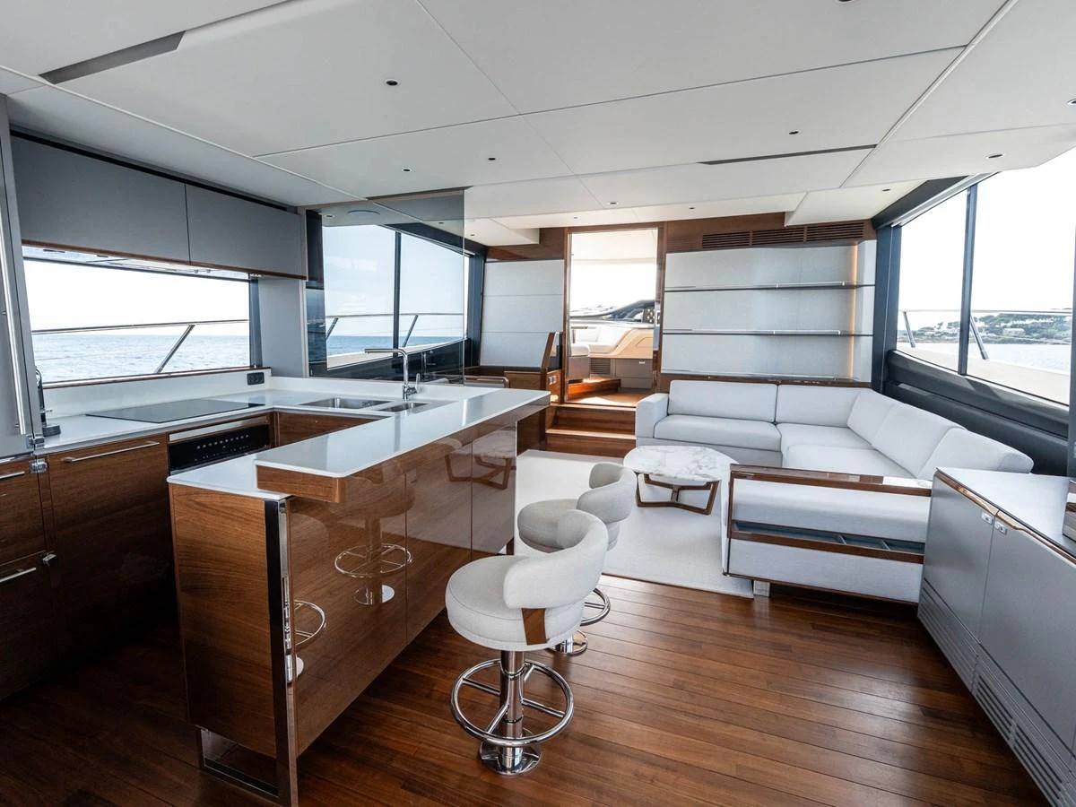 a living room with a large window aboard PRINCESS S80 Yacht for Sale