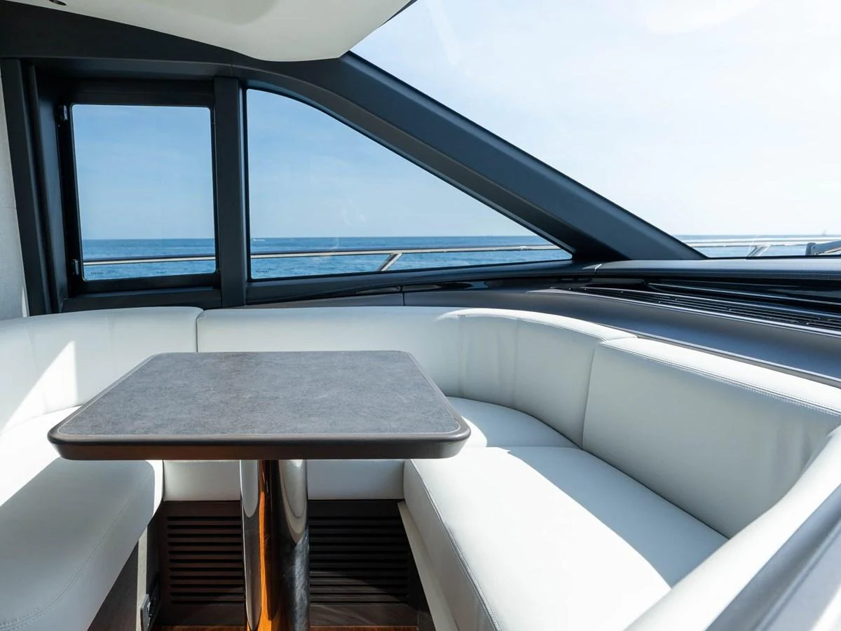 a table and chairs on a boat aboard PRINCESS S80 Yacht for Sale