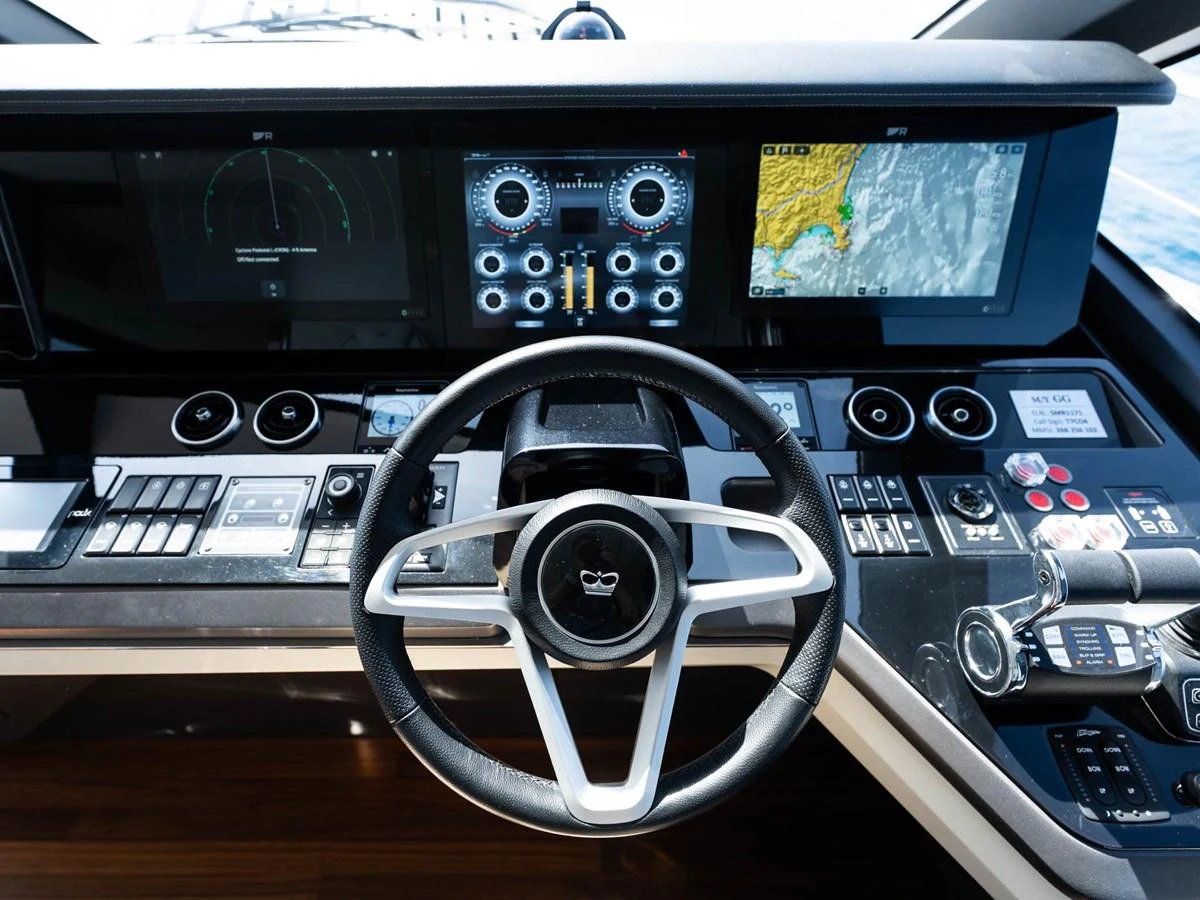 a steering wheel in a car aboard PRINCESS S80 Yacht for Sale