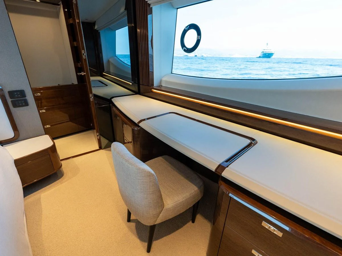 a room with a table and chairs aboard PRINCESS S80 Yacht for Sale