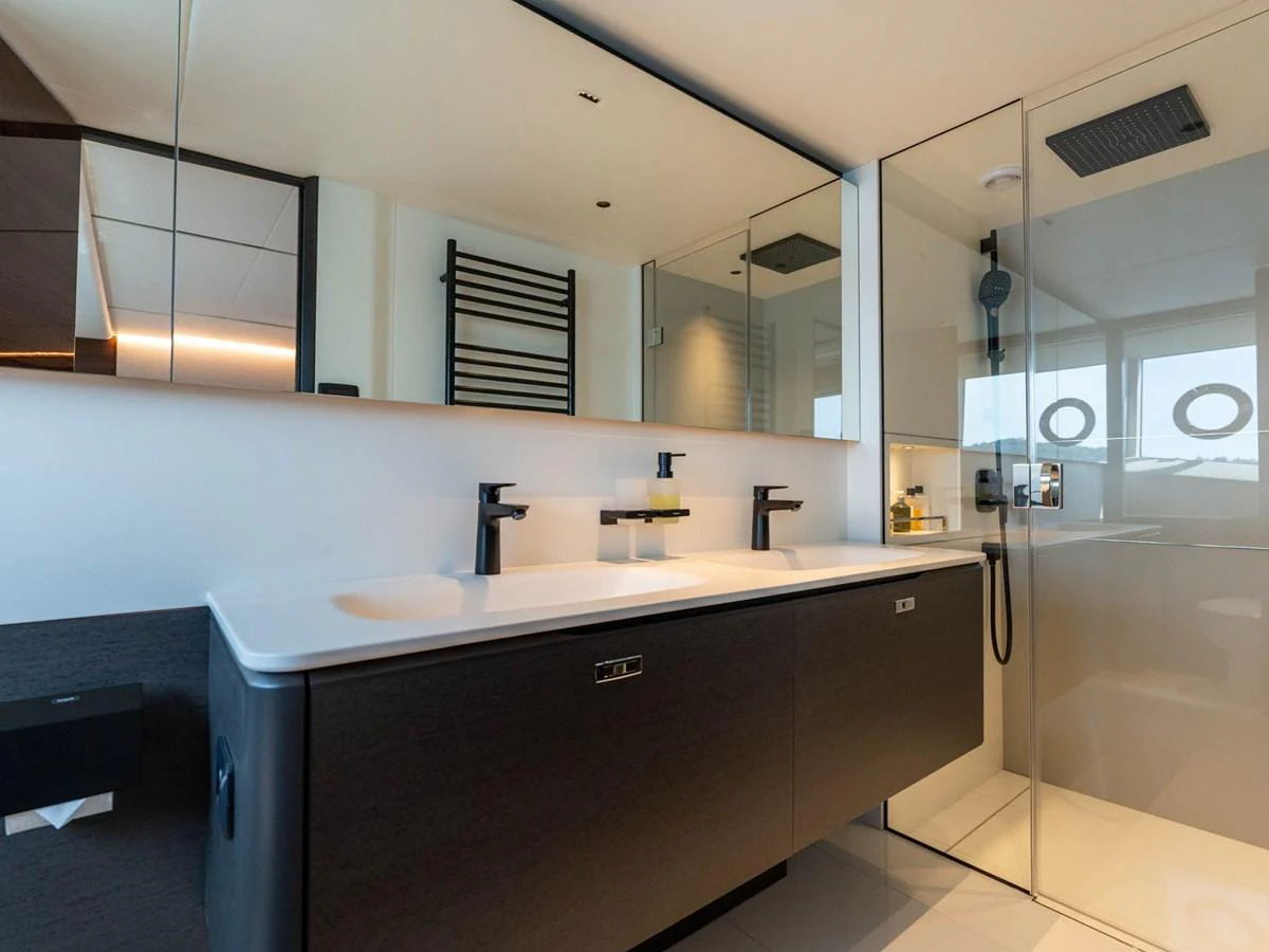 a bathroom with a large mirror aboard PRINCESS S80 Yacht for Sale