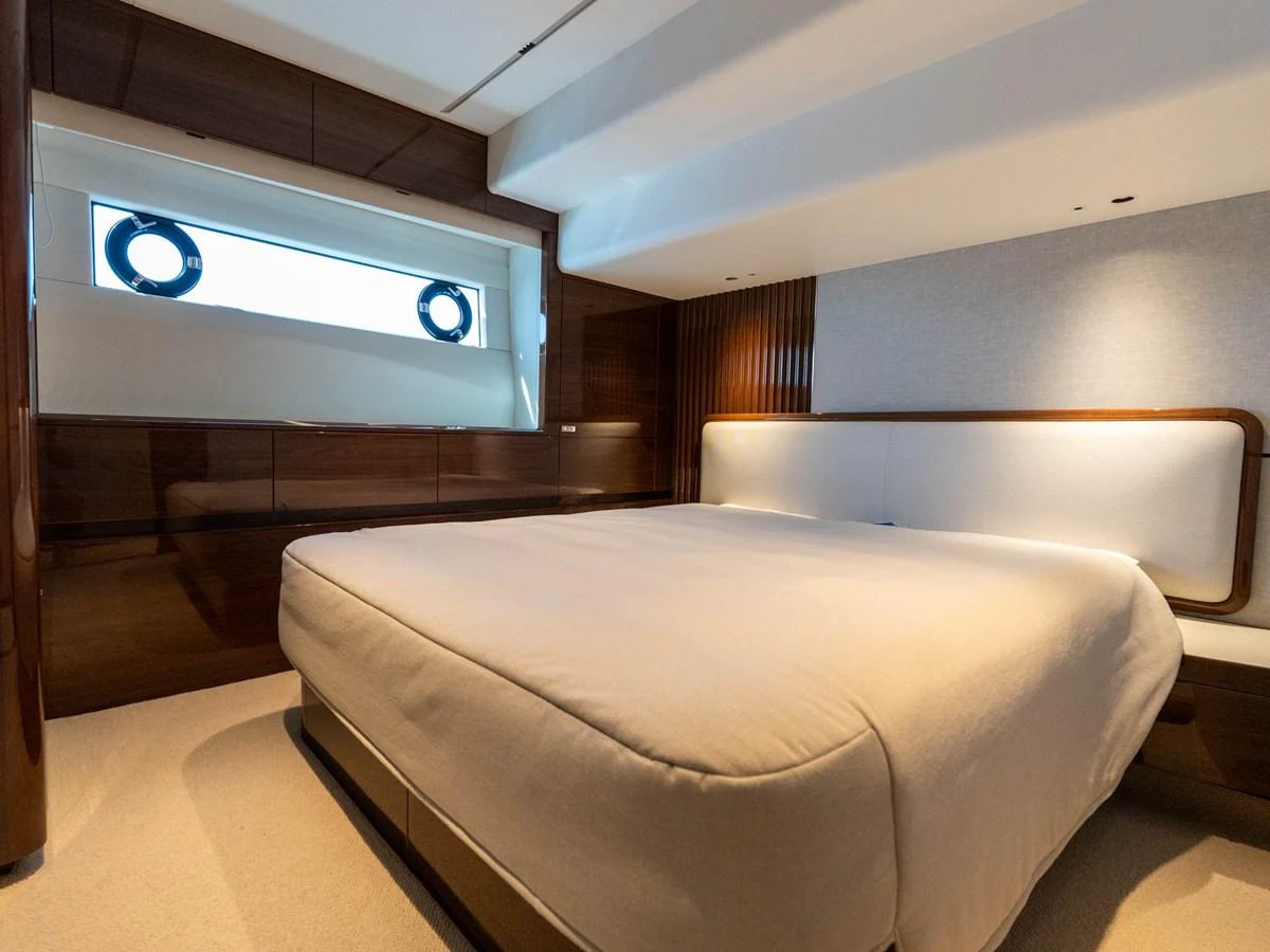a bed in a room aboard PRINCESS S80 Yacht for Sale