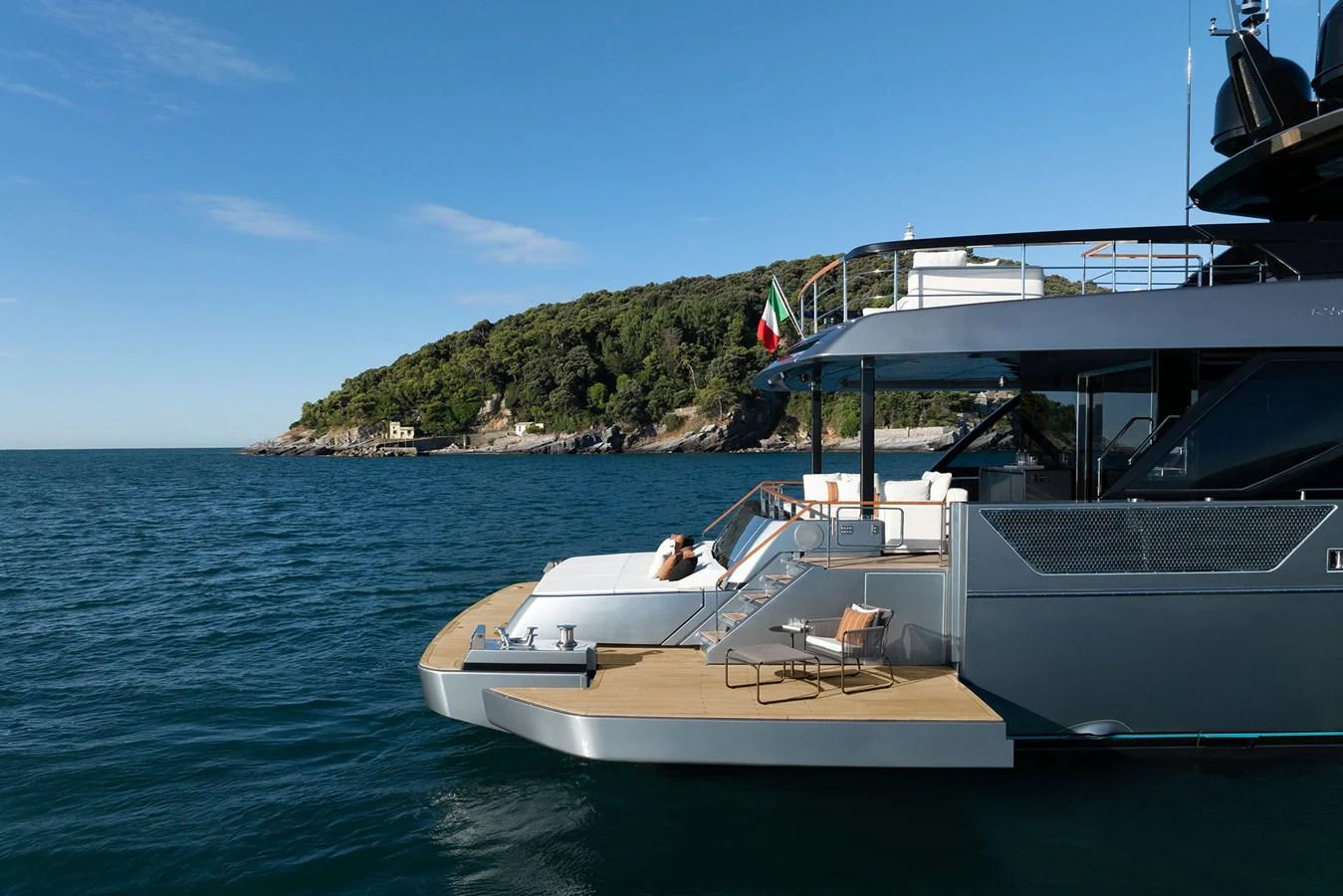 The yacht's aft deck offers a luxurious lounging area with stunning views of the surrounding waters. aboard RIVA 112 DOLCEVITA SUPER Yacht for Sale