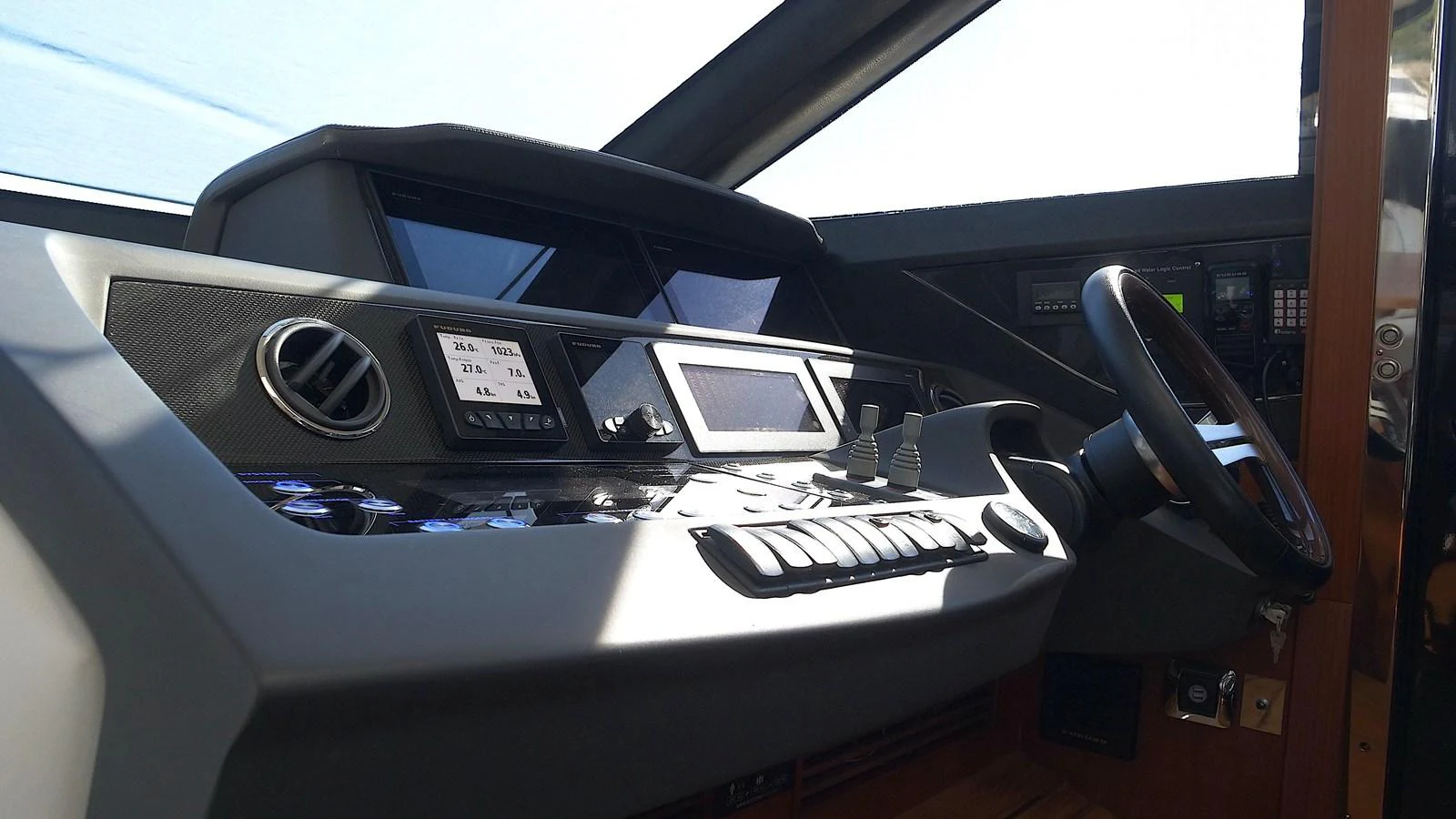The helm station features advanced navigation equipment and a sleek, modern design. aboard GIA GIA' Yacht for Sale