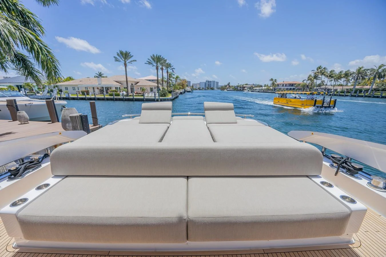 The sundeck offers plush sunbeds with a stunning waterfront view. aboard NO TIME TO DIE Yacht for Sale