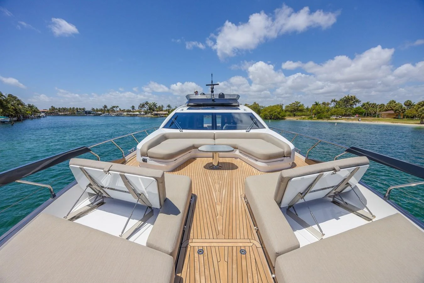 The foredeck features spacious sun loungers and a comfortable seating area, perfect for relaxation under the sun. aboard NO TIME TO DIE Yacht for Sale