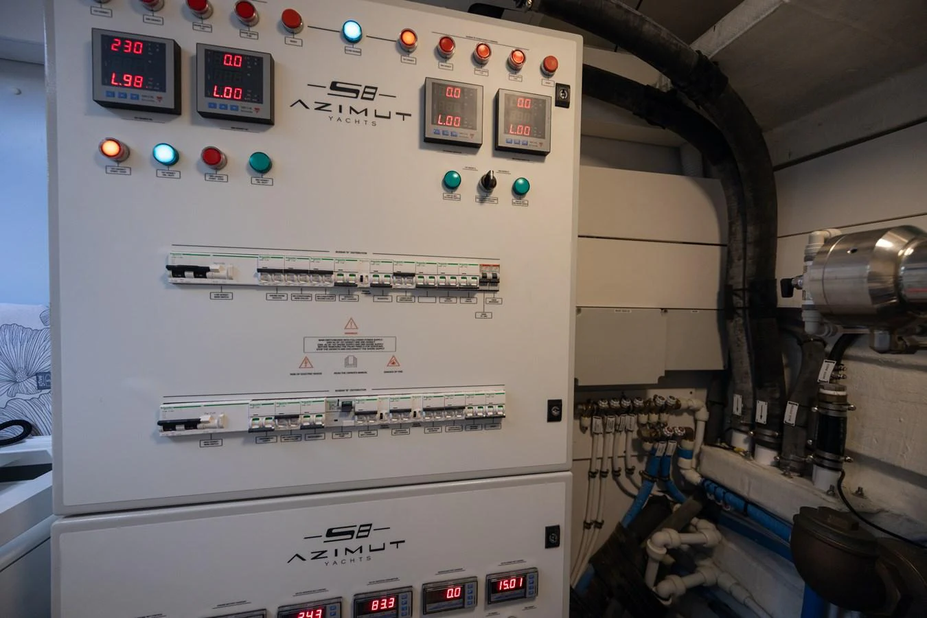 The image showcases the yacht's electrical control panels, highlighting its advanced systems and engineering. aboard NO TIME TO DIE Yacht for Sale