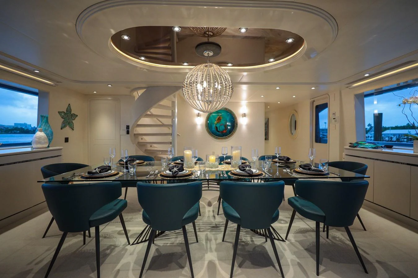 a large room with a table and chairs aboard CUPCAKE Yacht for Sale