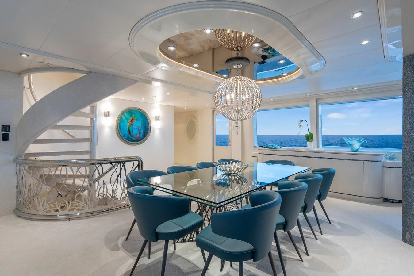 a room with a table and chairs aboard CUPCAKE Yacht for Sale
