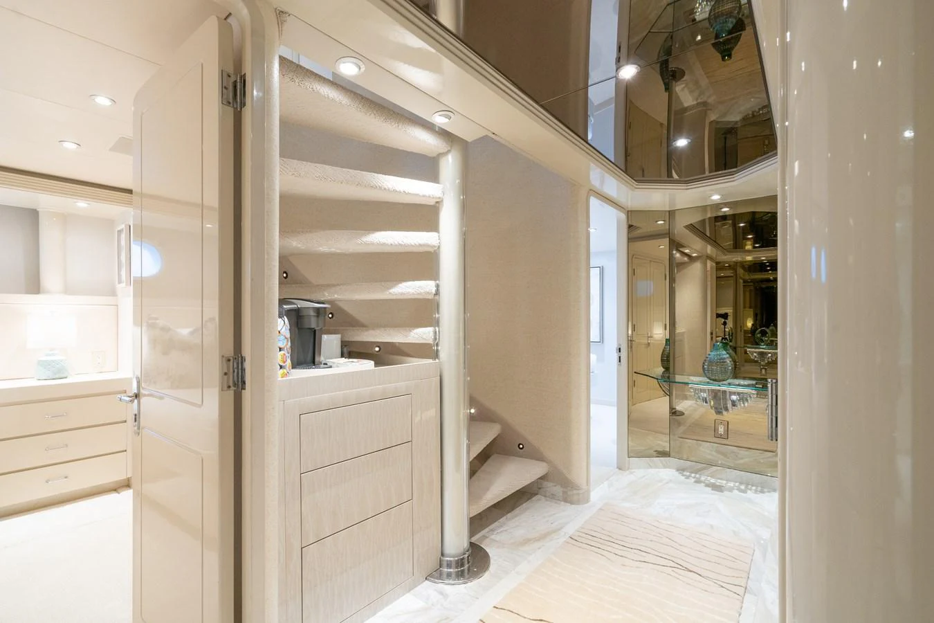 a room with a closet and a staircase aboard CUPCAKE Yacht for Sale