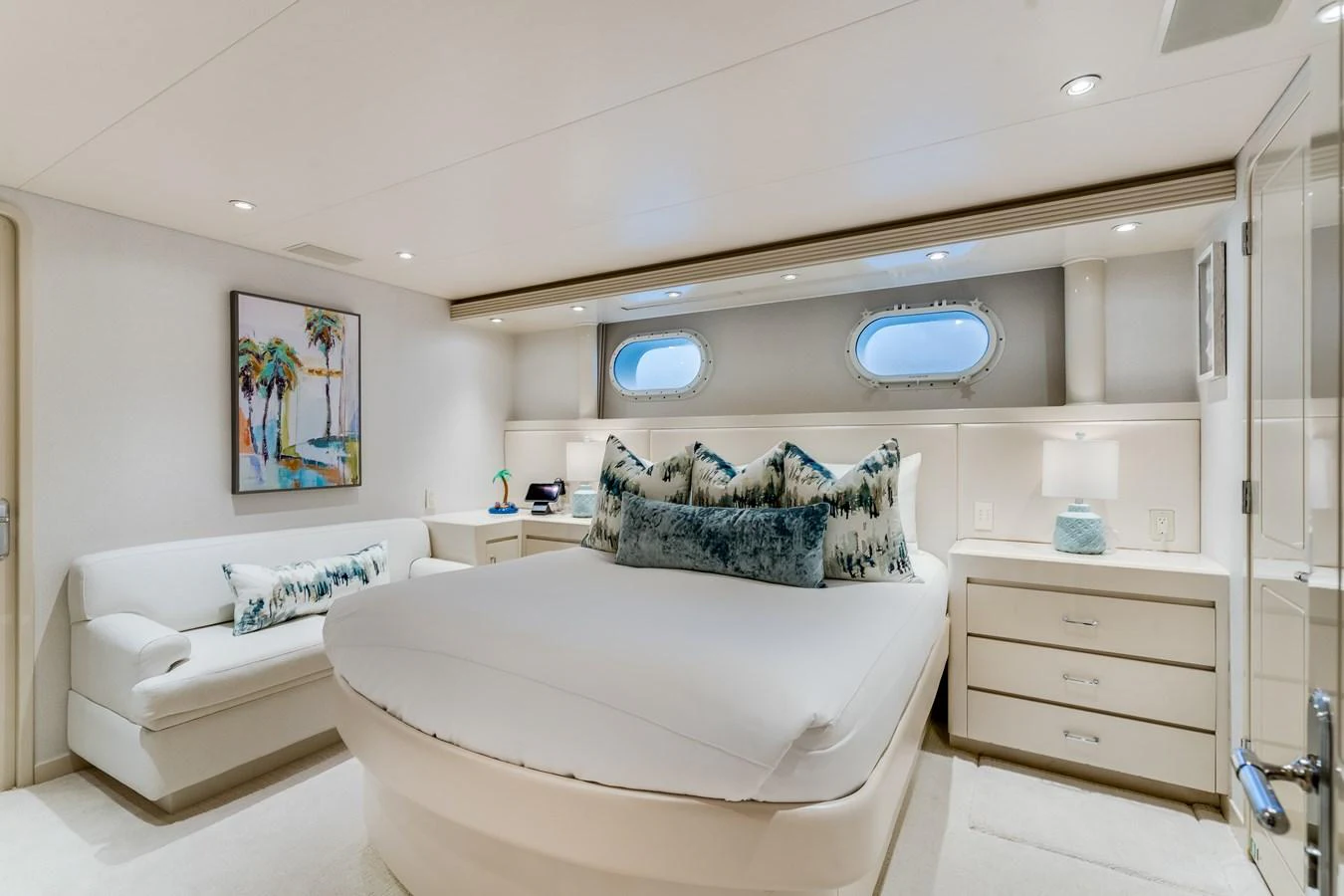 a white bedroom with a bed aboard CUPCAKE Yacht for Sale